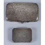 A silver Mappin & Webb pill box with engine turned decoration, 2" wide, and a silver cigarette case,