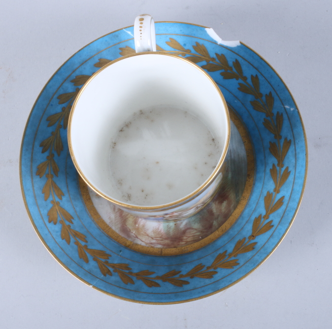 A Sevres porcelain coffee can, single panel decorated young lovers, gilt highlights on a blue - Image 2 of 7