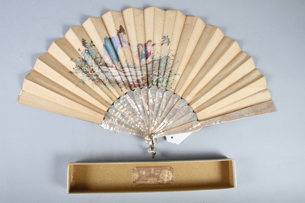 A Duvelleroy mother-of-pearl fan with hand-painted figure decorated vane, 10 3/4" long, in