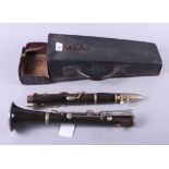 A Hawkes & Son clarinet, in case