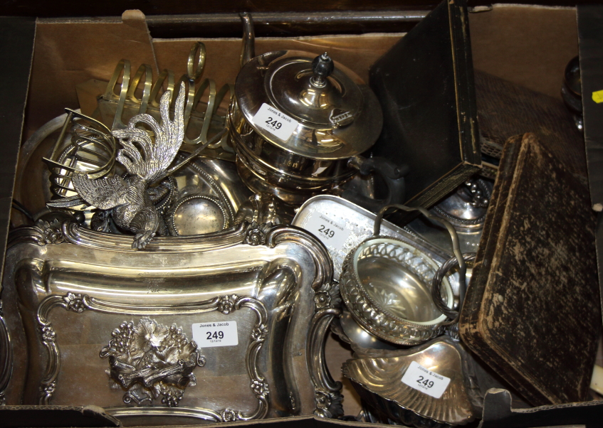 A pair of silver plated entree dishes and covers, one other, a shell-shaped preserve dish and