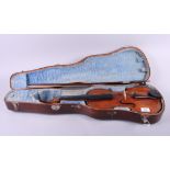 A late 19th century violin, in case, with one bow