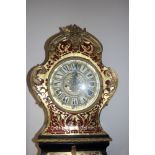 A Boulle type long case clock with stamped brass dial and shaped case, 82" high
