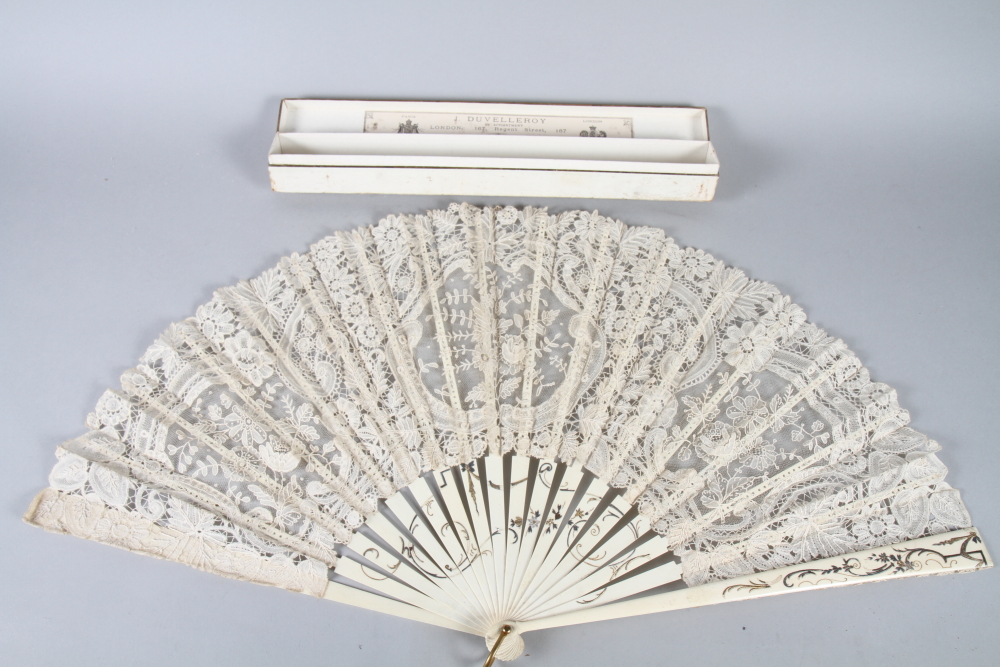 A J Duvelleroy early 20th century cream lace fan with bone sticks and bone guards" long, in original