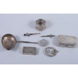 A silver cigarette case, two silver dagger brooches and various other silver