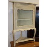 A late 19th century dove grey painted corner cabinet enclosed glazed door, on cabriole supports