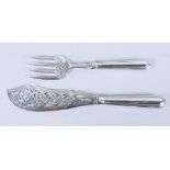 A pair of Victorian silver fish servers with pierced and engraved decoration