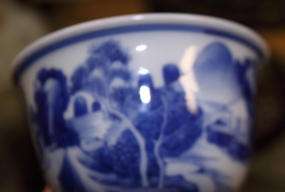 A Chinese porcelain blue and white landscape decorated stem cup, 4 1/2" high, a Kangxi vase, 3 1/ - Image 13 of 21