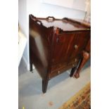 A 19th century mahogany tray top bedside cupboard with faux drawer front, 20" wide