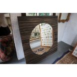 A Zebrano framed wall mirror with circular plate, 19" dia