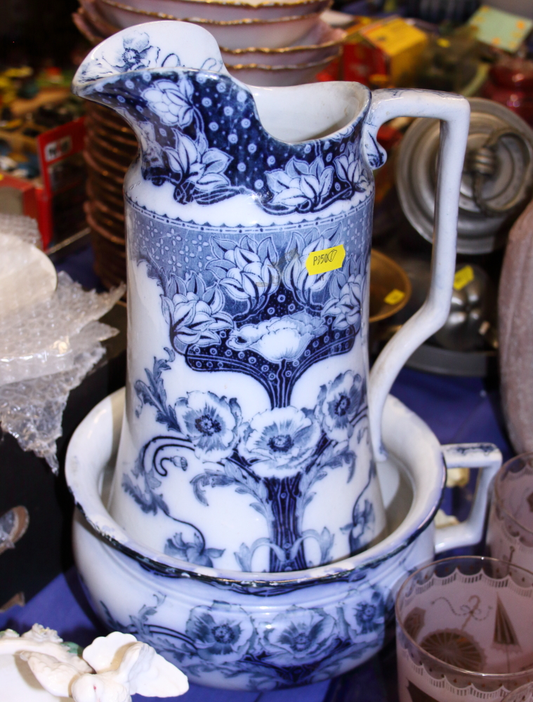 An early 20th century blue and white toilet jug, a chamber pot, three blue and white jars and - Image 5 of 5