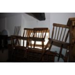 A set of four spindle back Windsor chairs