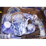 A blue and white “Willow” pattern meat dish and various other blue and white decorated ceramics