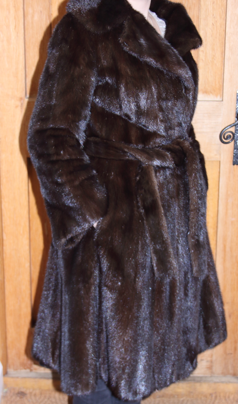 A Balmain full length mink coat with mink belt, back 44" long