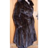 A Balmain full length mink coat with mink belt, back 44" long