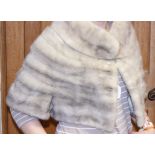 A mid 20th century silver mink silk lined capelet