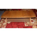 An Ercol low coffee table with slatted under-tier, 41" wide