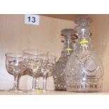 A pair of 19th century decanters and a set of five glasses