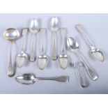 A matched set of eight Georgian silver dessert spoons, a Georgian silver sauce ladle and a pair of