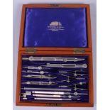 A set of W H Harling drawing instruments, in fitted mahogany case