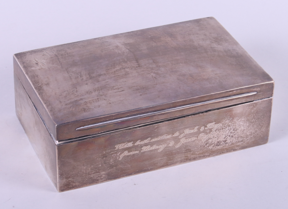 A silver cigarette box, 9" wide