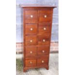 An Oriental hardwood chest of eight square drawers, 19" wide, and a companion chest of four