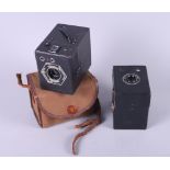 A box camera, in leather case, and two smaller box cameras