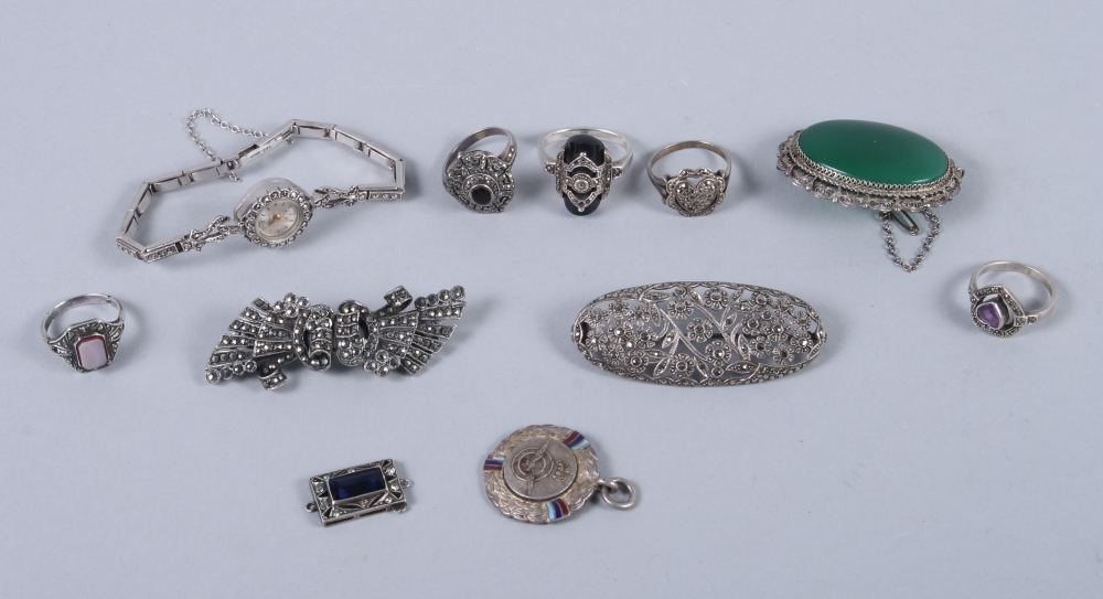 A quantity of silver and marcasite and other gem set jewellery, including brooches, rings and a