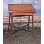 An Edwardian satinwood and rosewood banded fold-over top patience table, on square taper supports