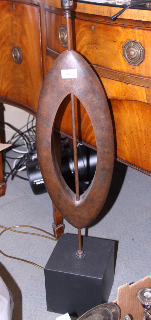 A modern copper free form table lamp, on cube base, 38" high