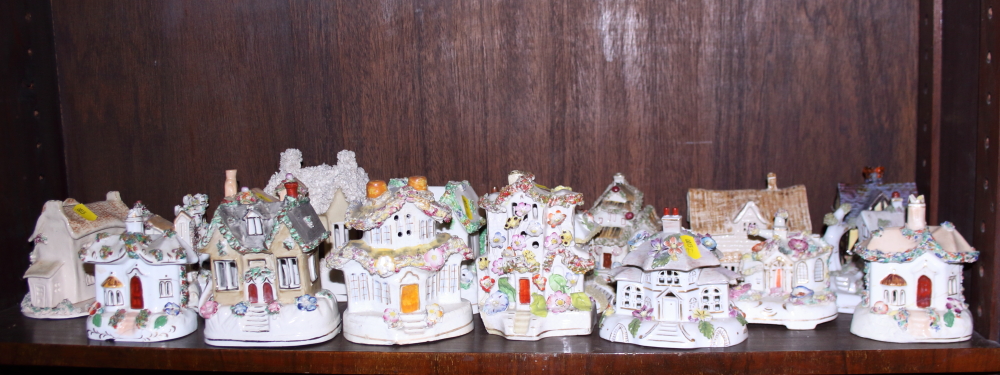 A collection of Staffordshire and other ceramic pastille burners (damages)