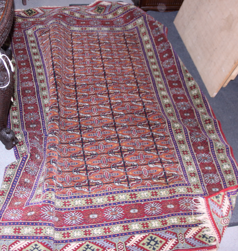 A Herati rug with all-over design on a red ground, 72" x 50 1/2" approx