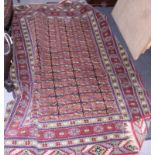 A Herati rug with all-over design on a red ground, 72" x 50 1/2" approx