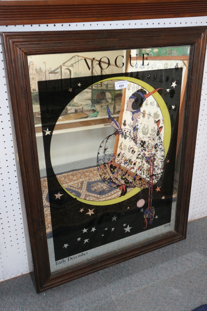 A "Vogue 1919" printed wall mirror, in moulded frame, plate 27" x 20"