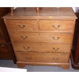 An Edwardian ash chest of two short and three long graduated drawers, with brass bail handles, on