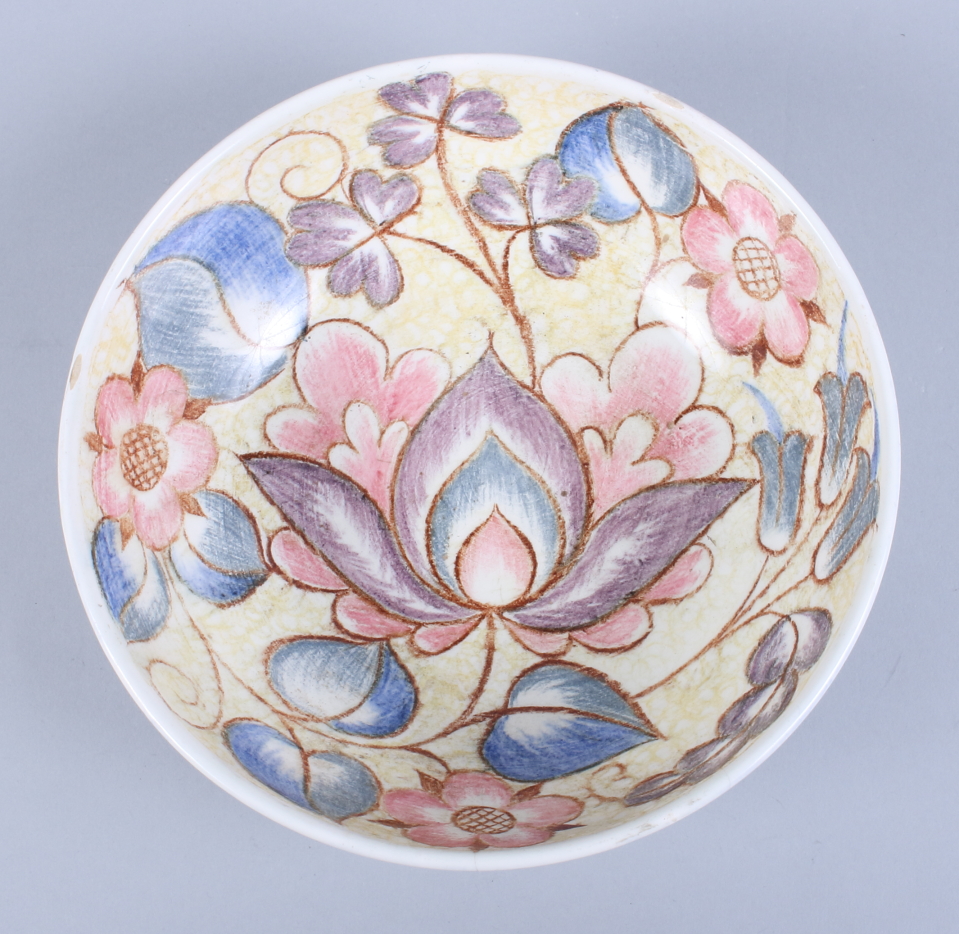 A Midwinter bowl, designed by Nancy Great-Rex, decorated in a floral pattern, 8" wide