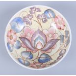 A Midwinter bowl, designed by Nancy Great-Rex, decorated in a floral pattern, 8" wide