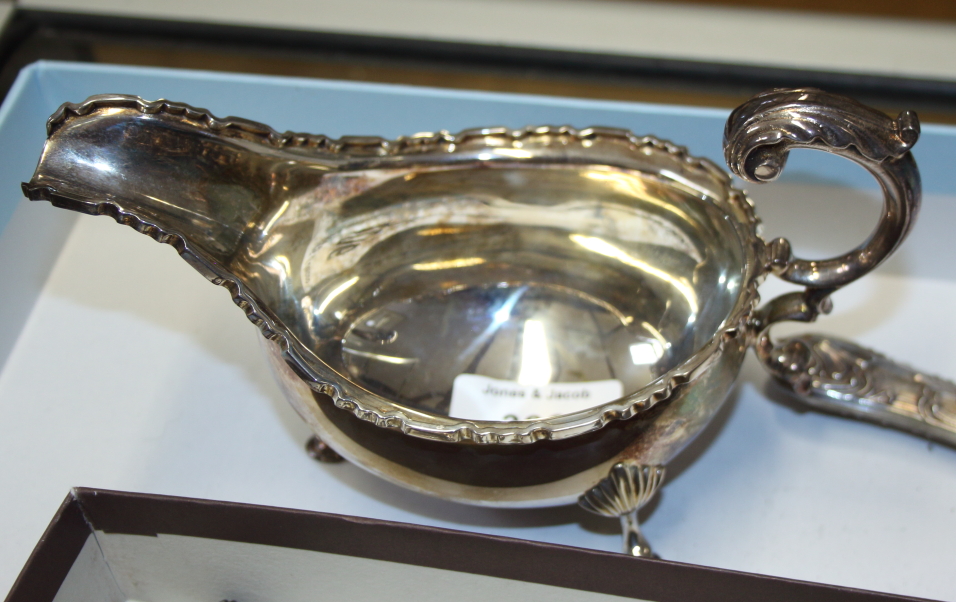 A silver sauce boat, three silver napkin rings, three silver spoons and various other silver items - Image 4 of 4