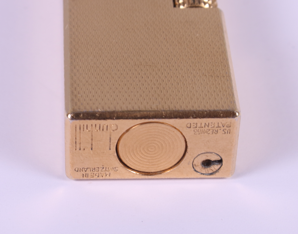 A gold plated Dunhill butane cigarette lighter with engine turned decoration - Image 2 of 3