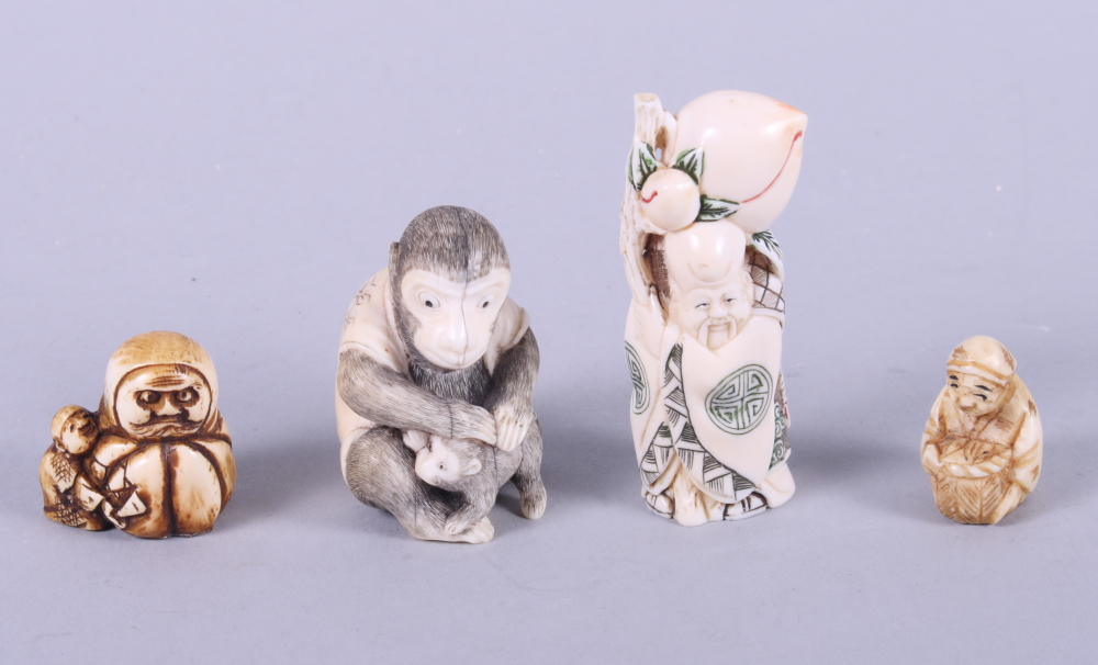 A carved netsuke of a monkey and young, 2" high, and three others