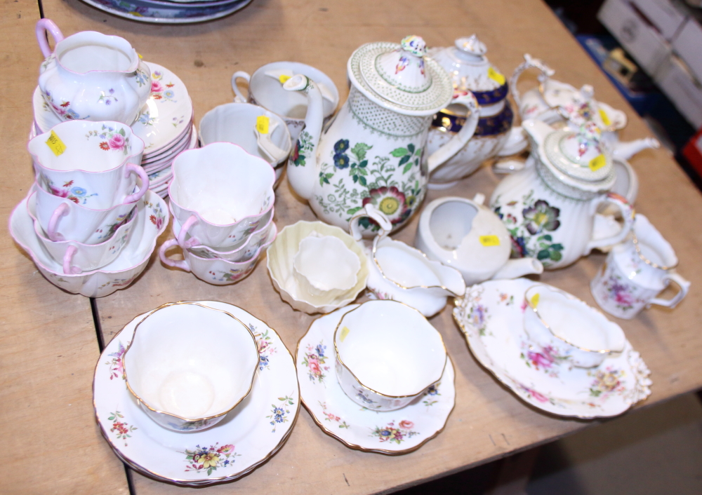 A Belleek miniature teacup, a similar sugar bowl, a Shelley part tea service, a Hammersley part
