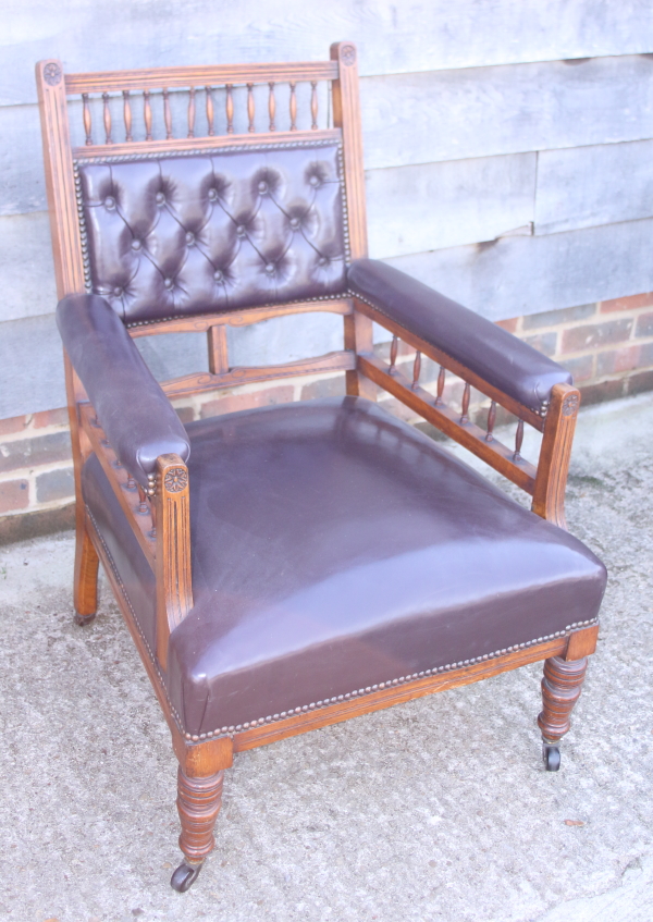 An Edwardian walnut open armchair, button upholstered in a brown leather, and a companion nursing - Image 3 of 3