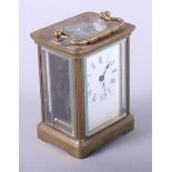 A brass cased carriage clock with enamel dial, 4 1/2" long