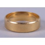 An 18ct gold band, size K, 3.4g