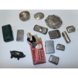 Five silver vesta cases, a white metal compact, a silver scent bottle (lacking interior), a metal
