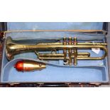 A Nevada brass trumpet, in case