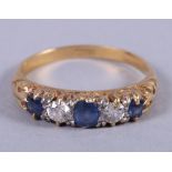 An 18ct gold sapphire and diamond ring, size N, 3.8g