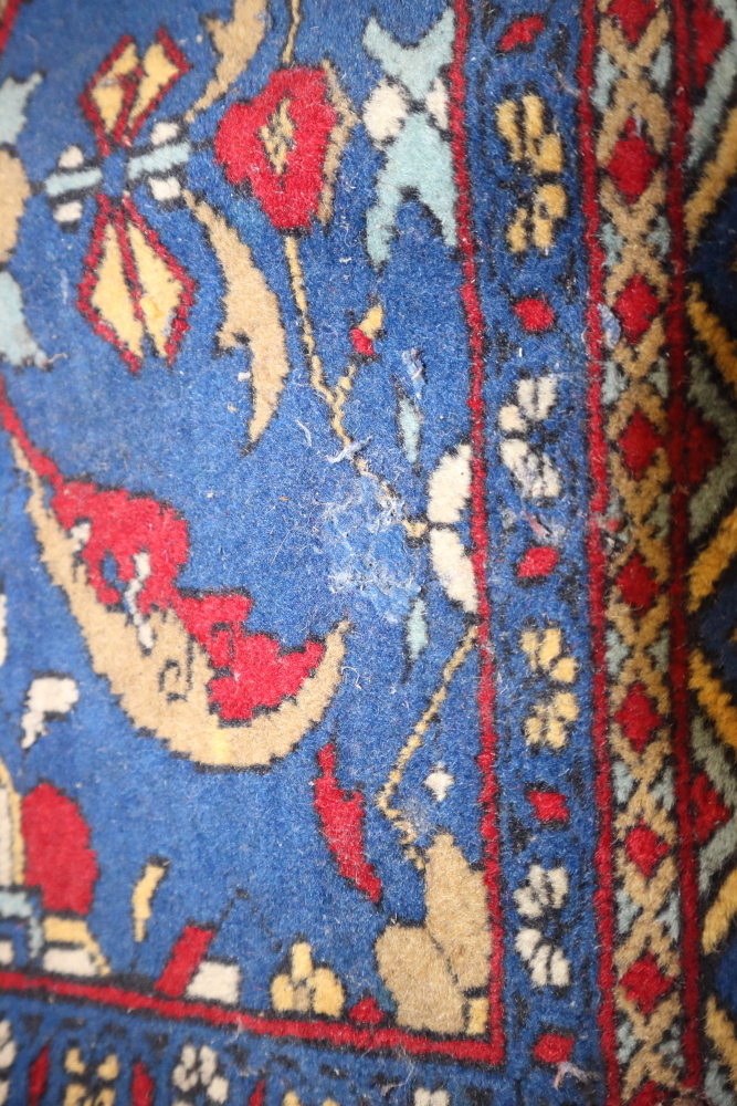 A Herati design rug with all-over pattern on a blue ground, 76" x 49" approx (traces of moth) - Image 2 of 3