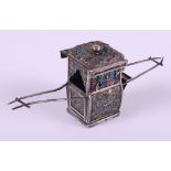 A 19th century Chinese export silver and enamel model of a sedan chair by Wang Hing, 4 3/4" long,