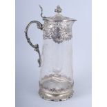 A late 19th century cut glass lemonade jug with Austro Hungarian 800 grade silver mounts